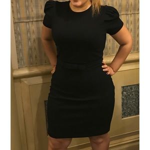 Black puffed shoulder dress